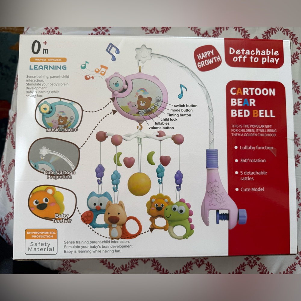 New, never opened, colorful and fun baby mobile!